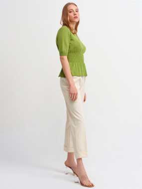 Green fashionable top with cream pant